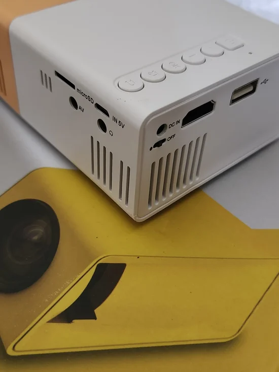Compact White and Yellow Mini Projector with Remote - Picture 2 of 5